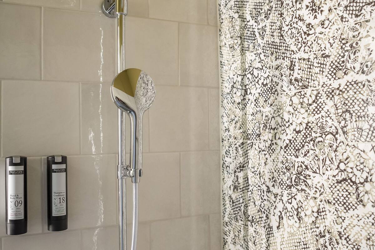 shower, eco-friendly toiletries, towels