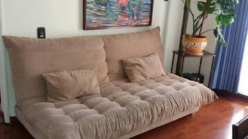 Deluxe Apartment, 2 Bedrooms | Living area | 32-inch LED TV with cable channels, TV