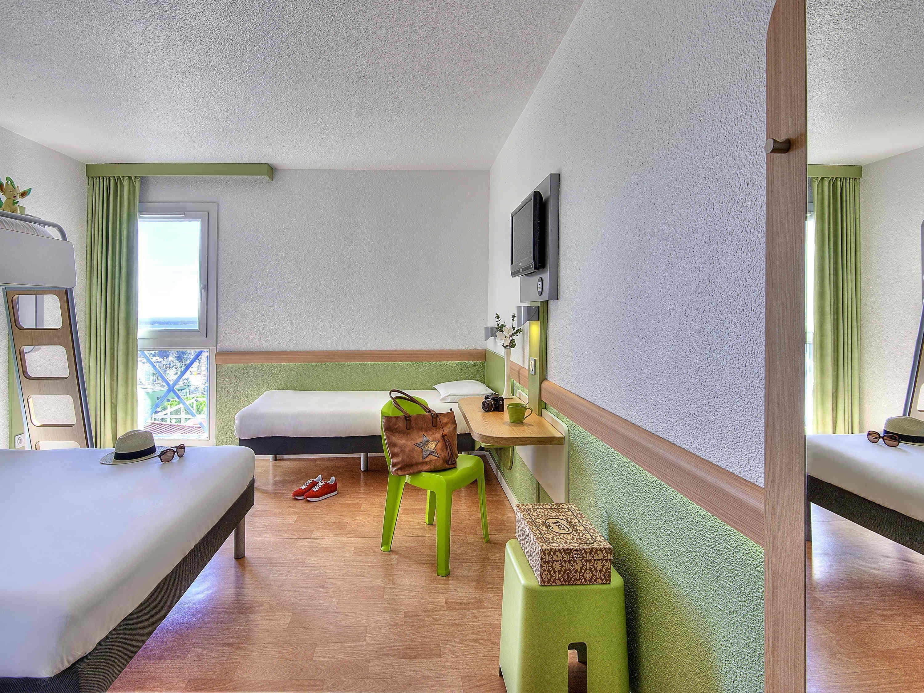 Standard Room (one double bed and one single bed) | Desk, soundproofing, free WiFi, bed sheets