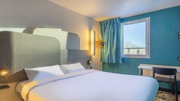 Desk, laptop workspace, blackout drapes, soundproofing