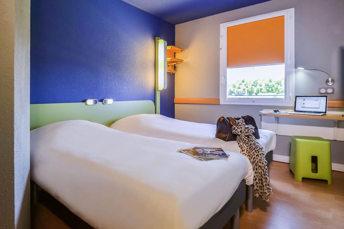 Twin Room, 2 Single Beds | Desk, soundproofing, iron/ironing board (on request), free WiFi