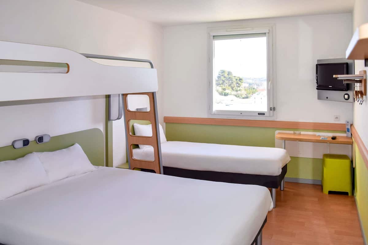 Family Room | Individually furnished, desk, blackout drapes, soundproofing