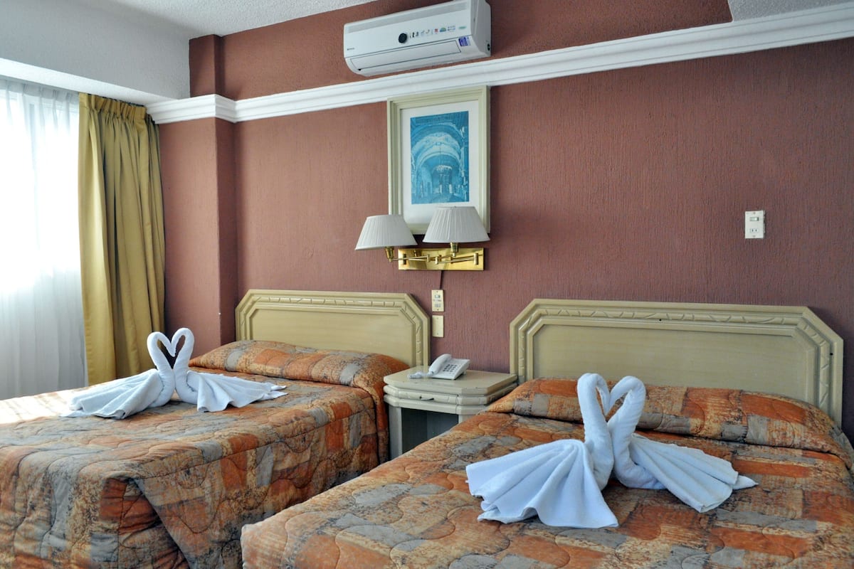 Kamar Quadruple | Brankas, meja kerja, Wi-Fi gratis, dan dapat diakses tamu berkursi roda