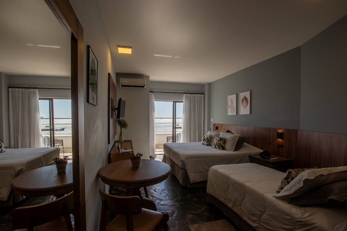 deluxe triple room | 1 bedroom, minibar, blackout curtains, iron/ironing board