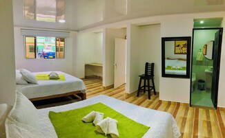 Classic Quadruple Room | Blackout drapes, iron/ironing board, free WiFi, bed sheets