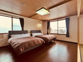 ジュニア スイート | ミニバー、WiFi (無料)、ベッドシーツ