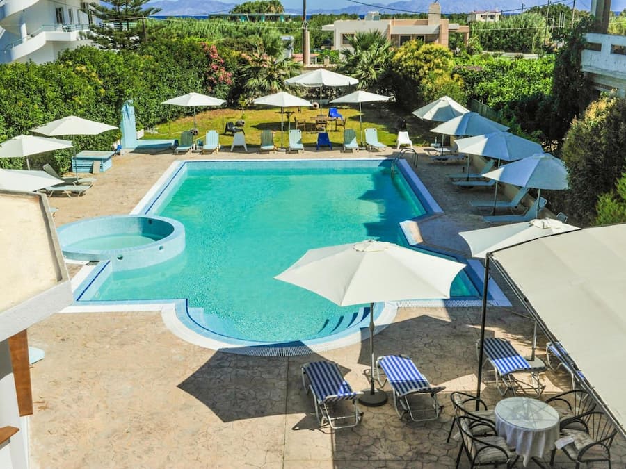 Seasonal outdoor pool, pool umbrellas, pool loungers