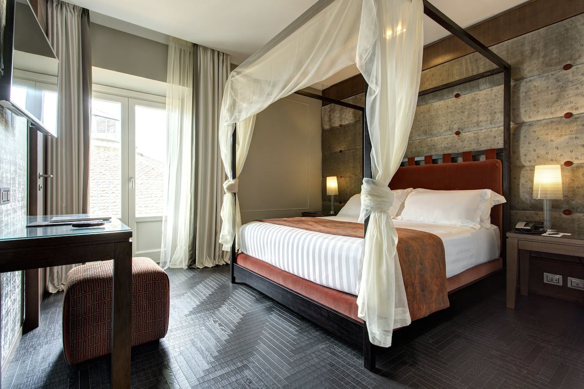 Suite | Down duvets, minibar, in-room safe, desk