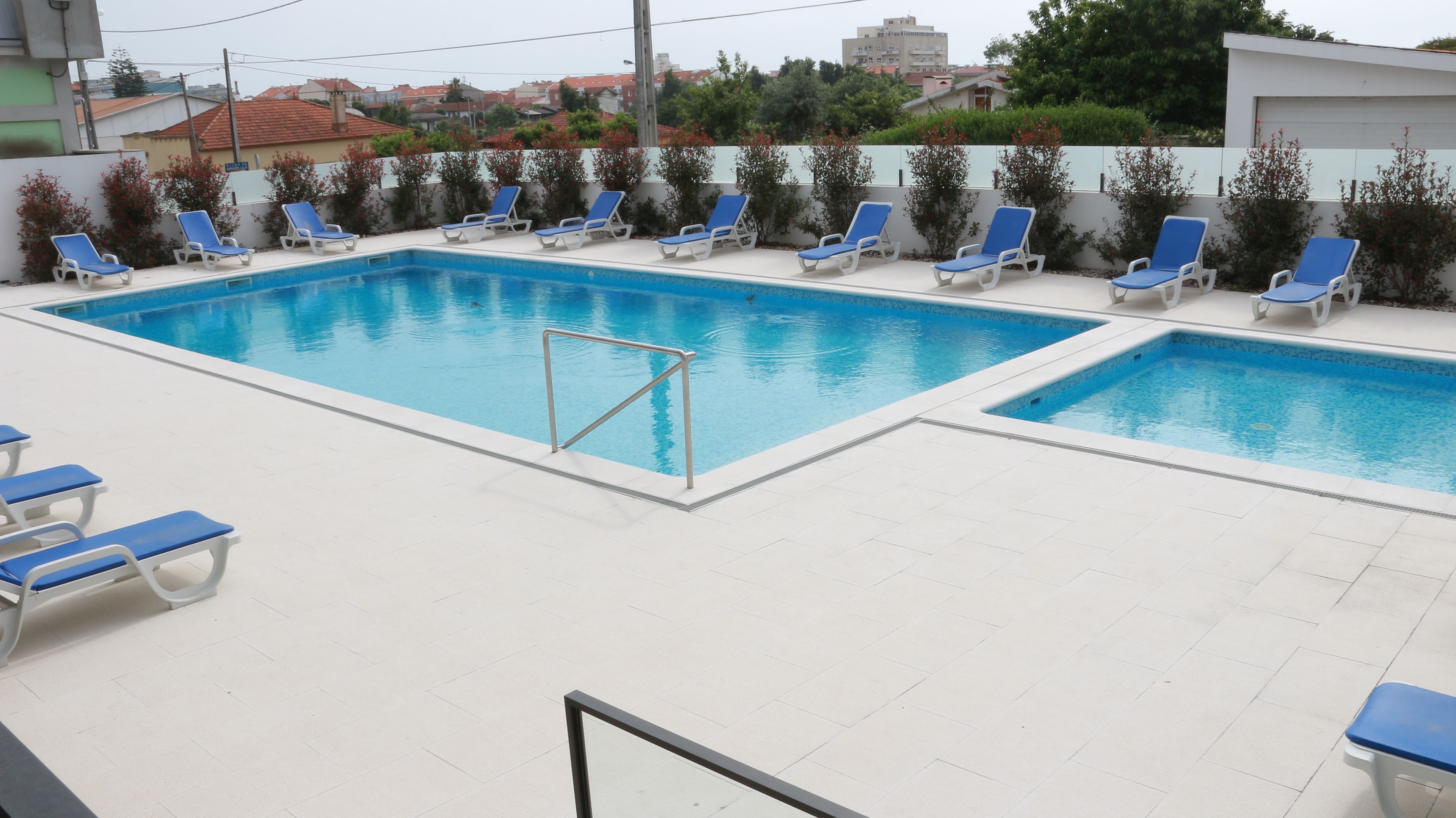 Seasonal outdoor pool, open 9:00 AM to 7:00 PM, pool umbrellas