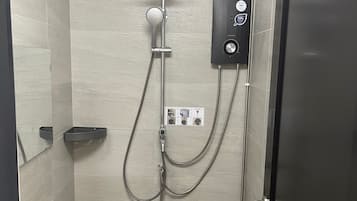 Shower, hydromassage showerhead, bidet, towels