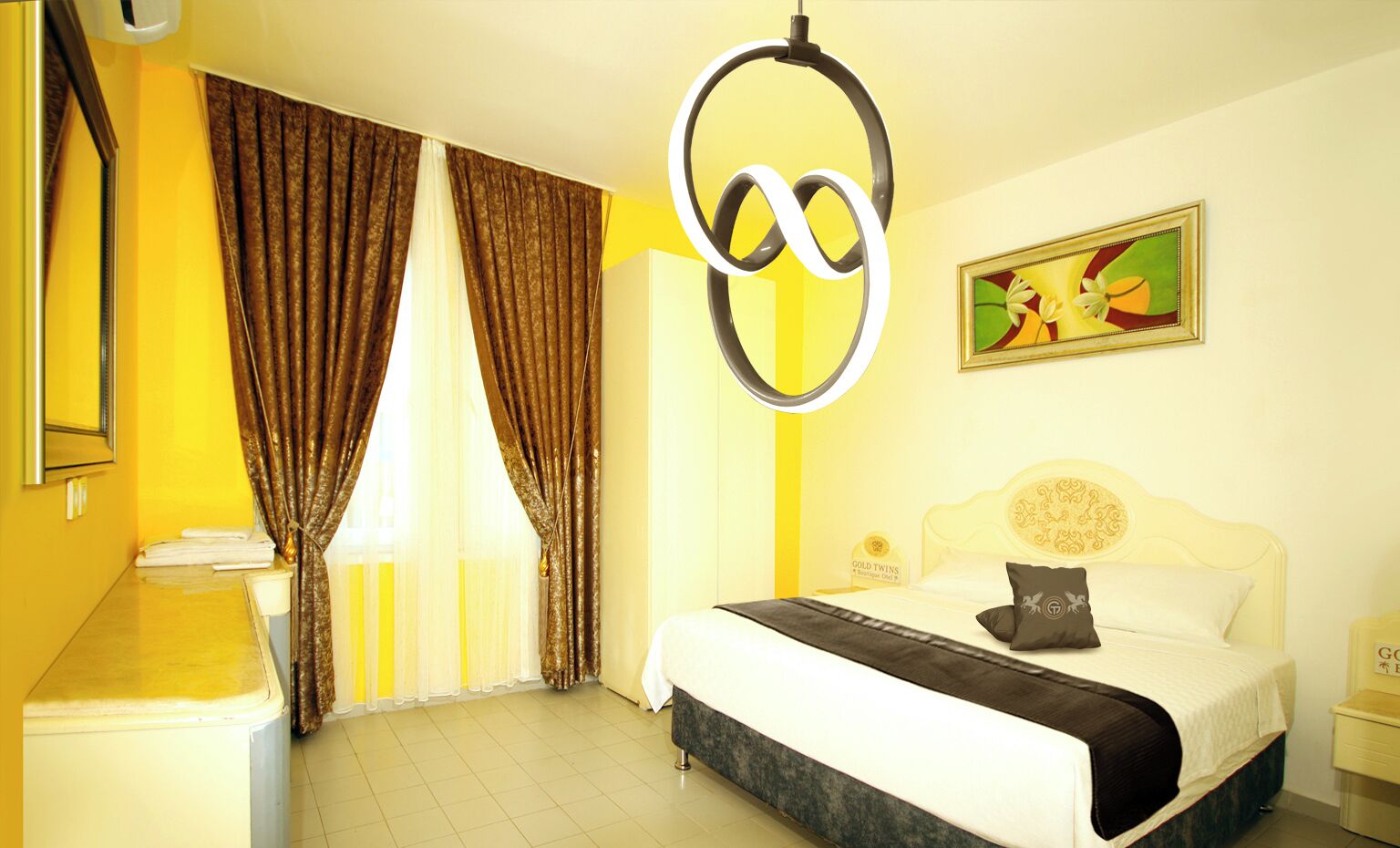 A hotel room with a bed, curtains, a painting, and a unique circular light fixture.