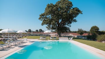 Outdoor pool, pool umbrellas, sun loungers