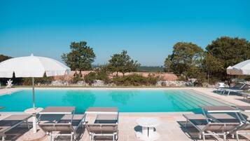 Outdoor pool, pool umbrellas, pool loungers