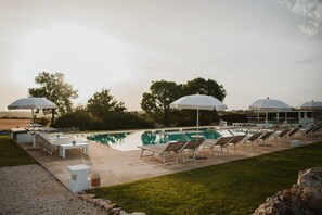 Outdoor pool, pool umbrellas, pool loungers