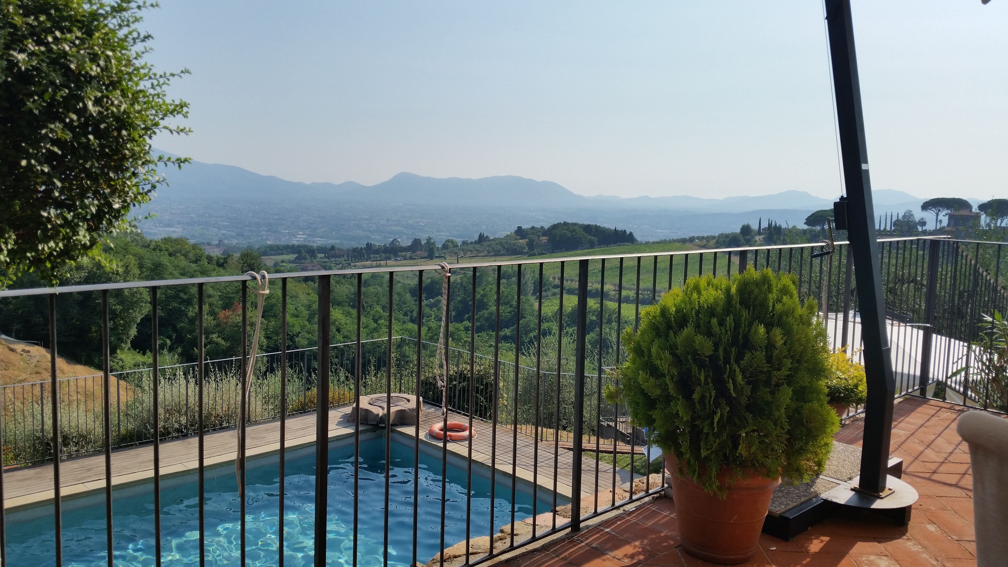 outdoor pool, pool umbrellas, pool loungers