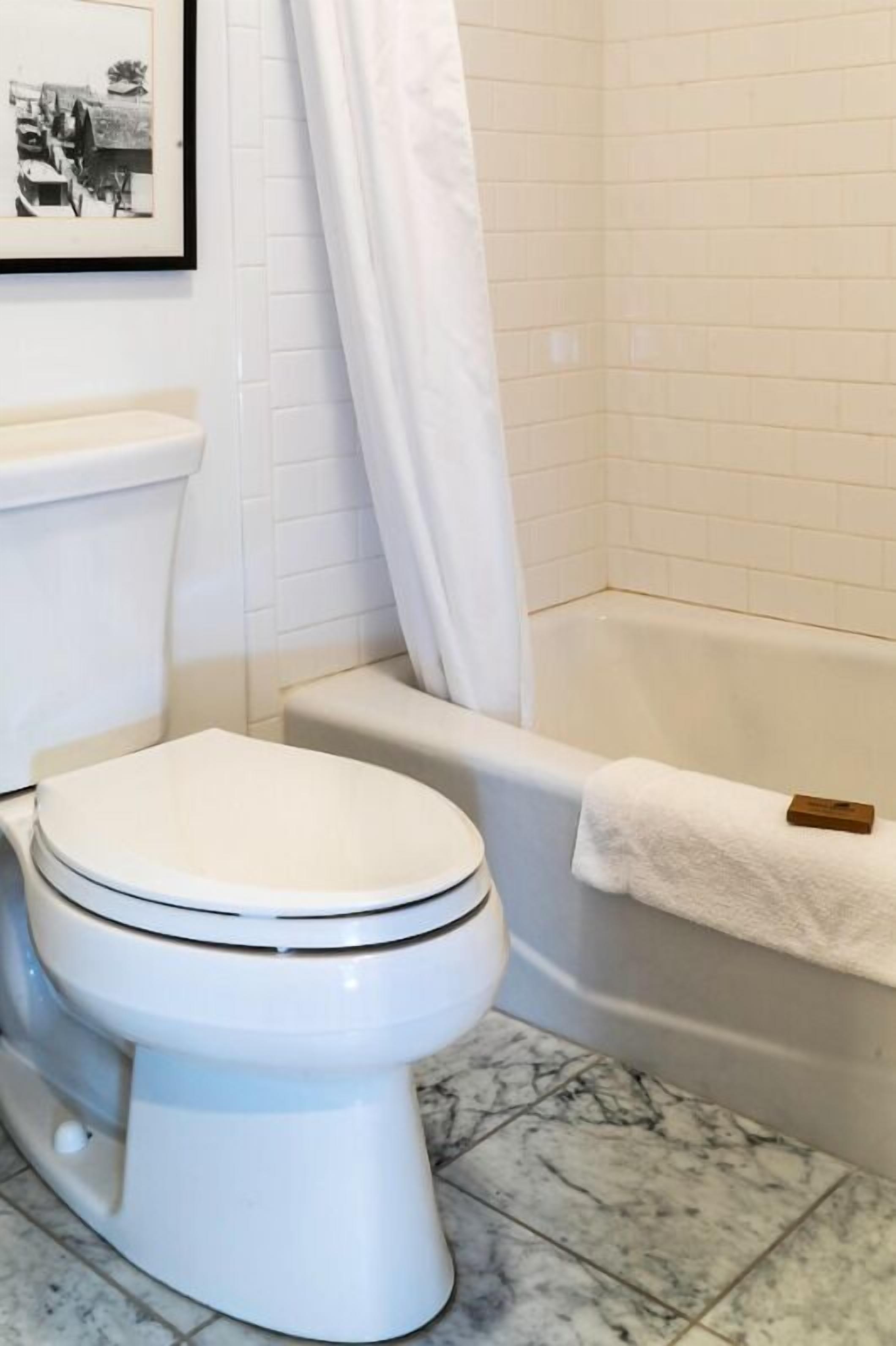 combined shower/bathtub, free toiletries, hair dryer, bathrobes