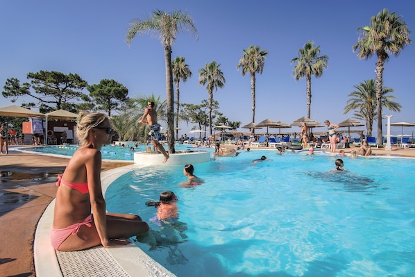 Seasonal outdoor pool, pool loungers