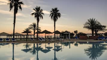 Seasonal outdoor pool, pool loungers