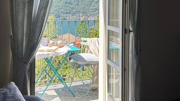 Apartment, 3 Bedrooms, Lake View | Living area | Flat-screen TV, pay movies