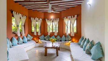 Standard Villa | Living area | Flat-screen TV