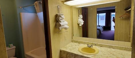 Standard Room, 2 Double Beds | Bathroom | Combined shower/tub, towels