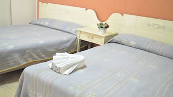 Standard Quadruple Room | In-room safe, desk, free WiFi, bed sheets