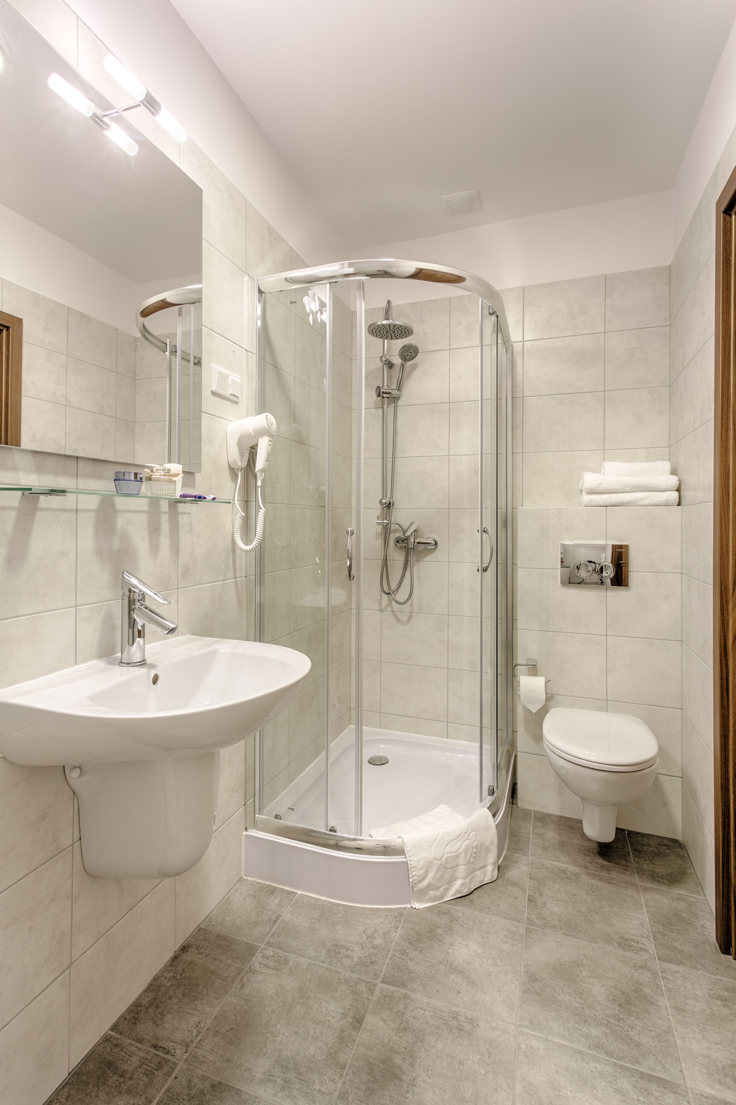 shower, free toiletries, hair dryer, towels