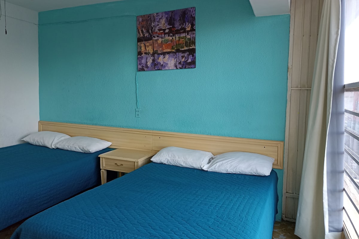 Quadruple Room | In-room safe, desk, free WiFi, bed sheets