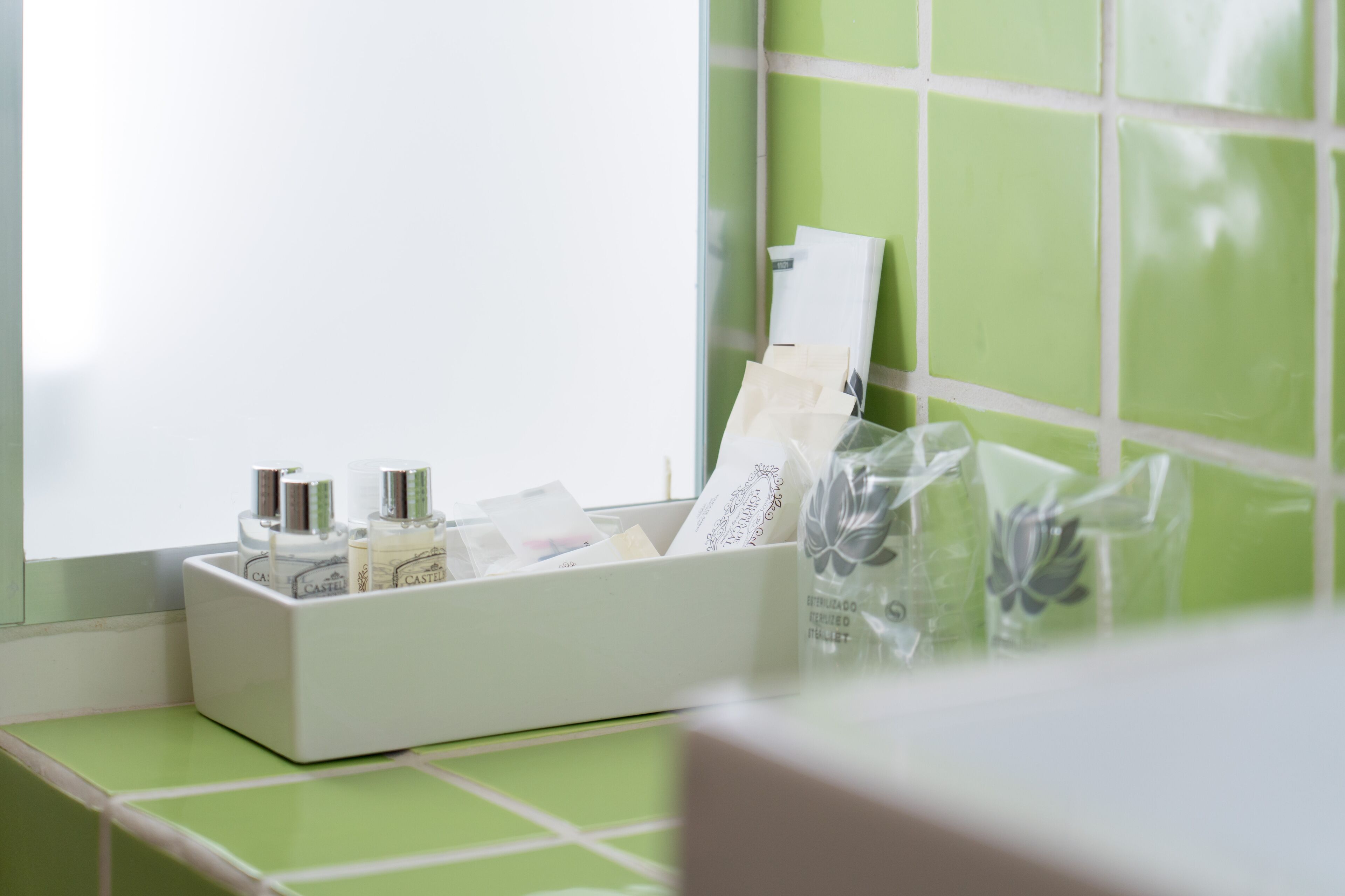 deep-soaking bathtub, bathrobes, slippers, towels