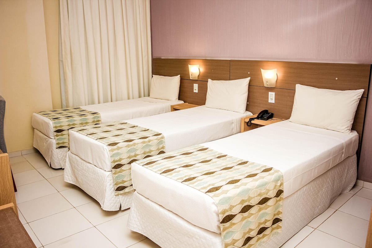 Minibar, desk, blackout curtains, travel cot