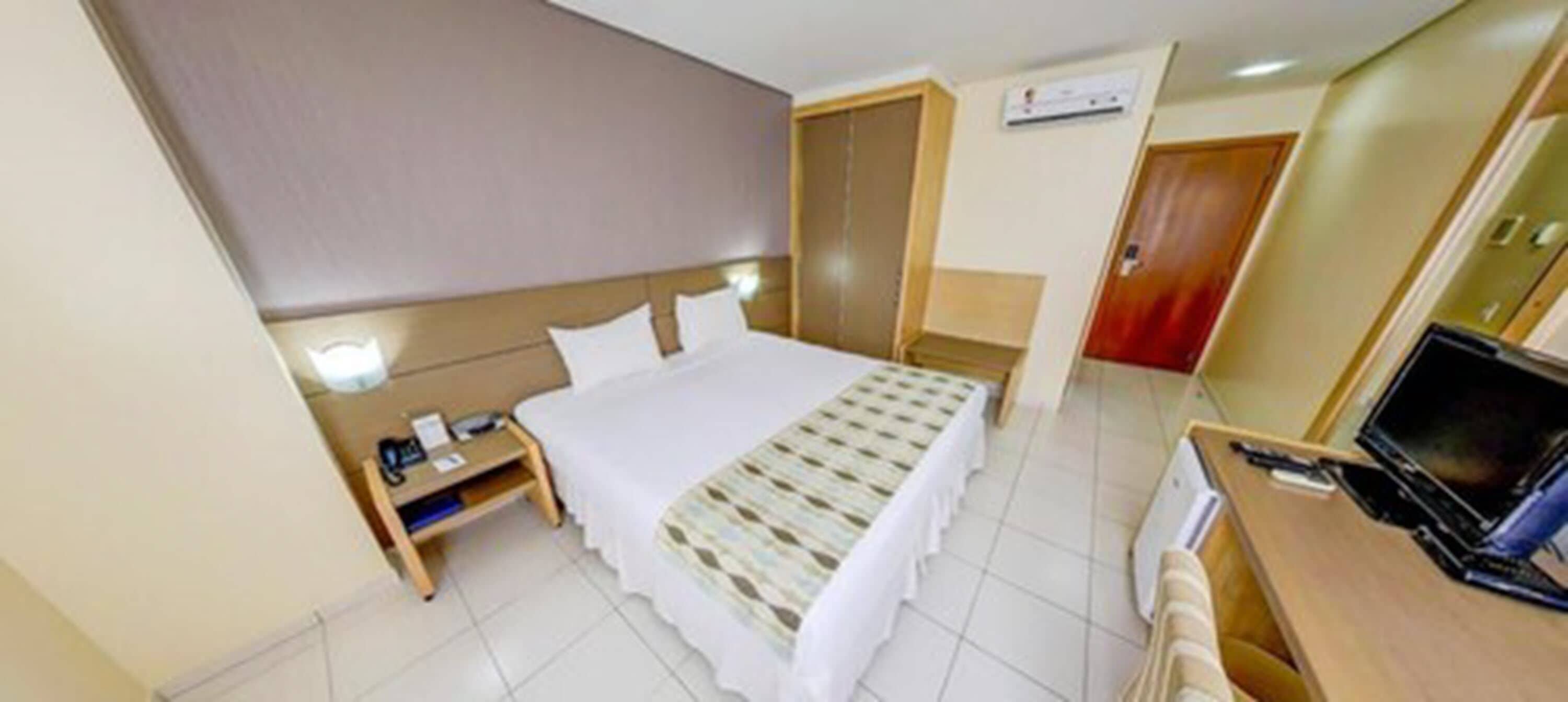 standard double room | minibar, desk, blackout curtains, travel cot