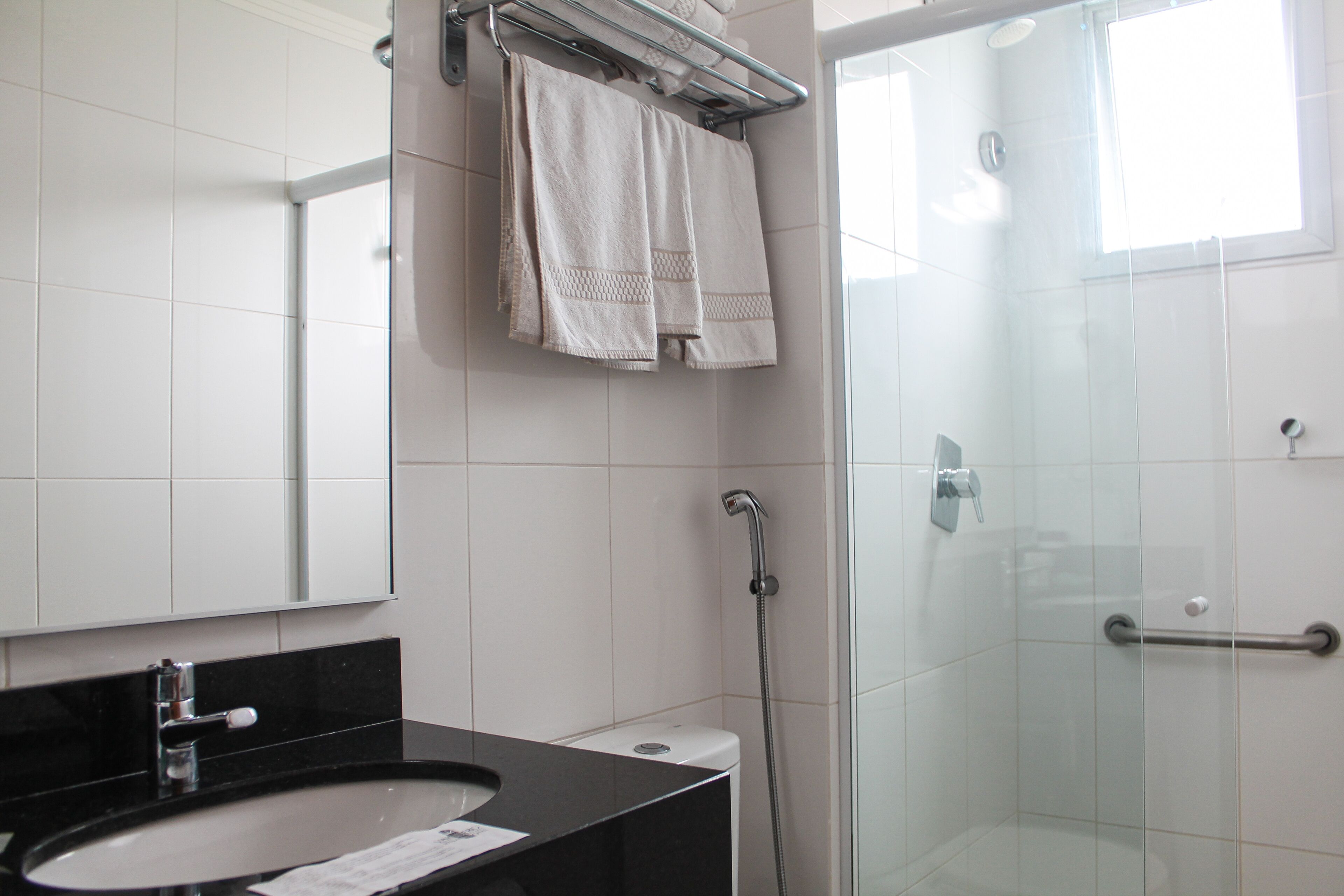 shower, free toiletries, hair dryer, towels