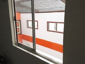 Quarto casal luxo, 1 cama de casal, banheiro privativo | Vista do quarto