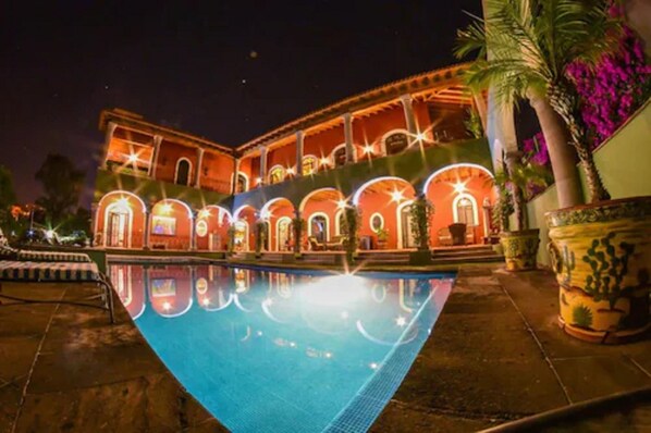 Outdoor pool, open 8 AM to 7 PM, pool umbrellas, pool loungers