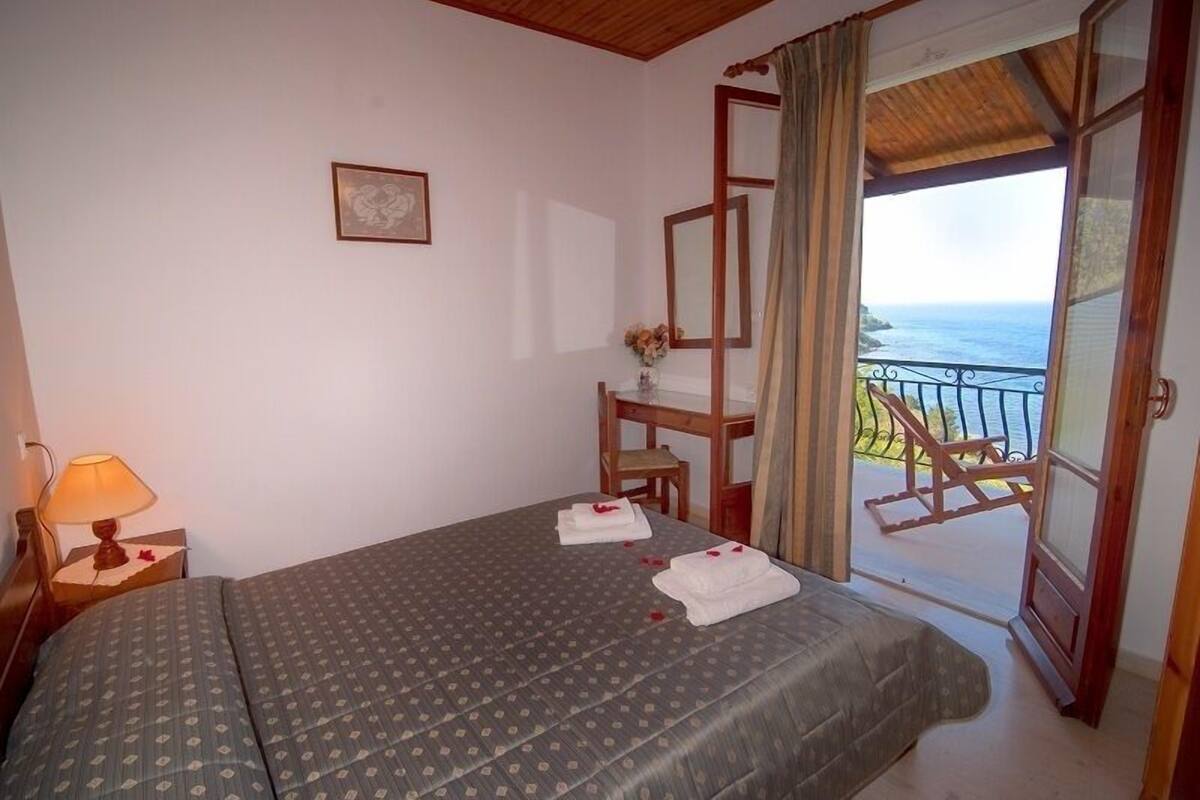 Apartment, 2 Bedrooms, Sea View | In-room safe, soundproofing, iron/ironing board, free cribs/infant beds