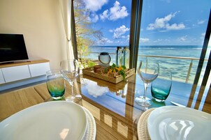 Panoramic Penthouse | Living area | 50-inch LCD TV with cable channels, TV, DVD player