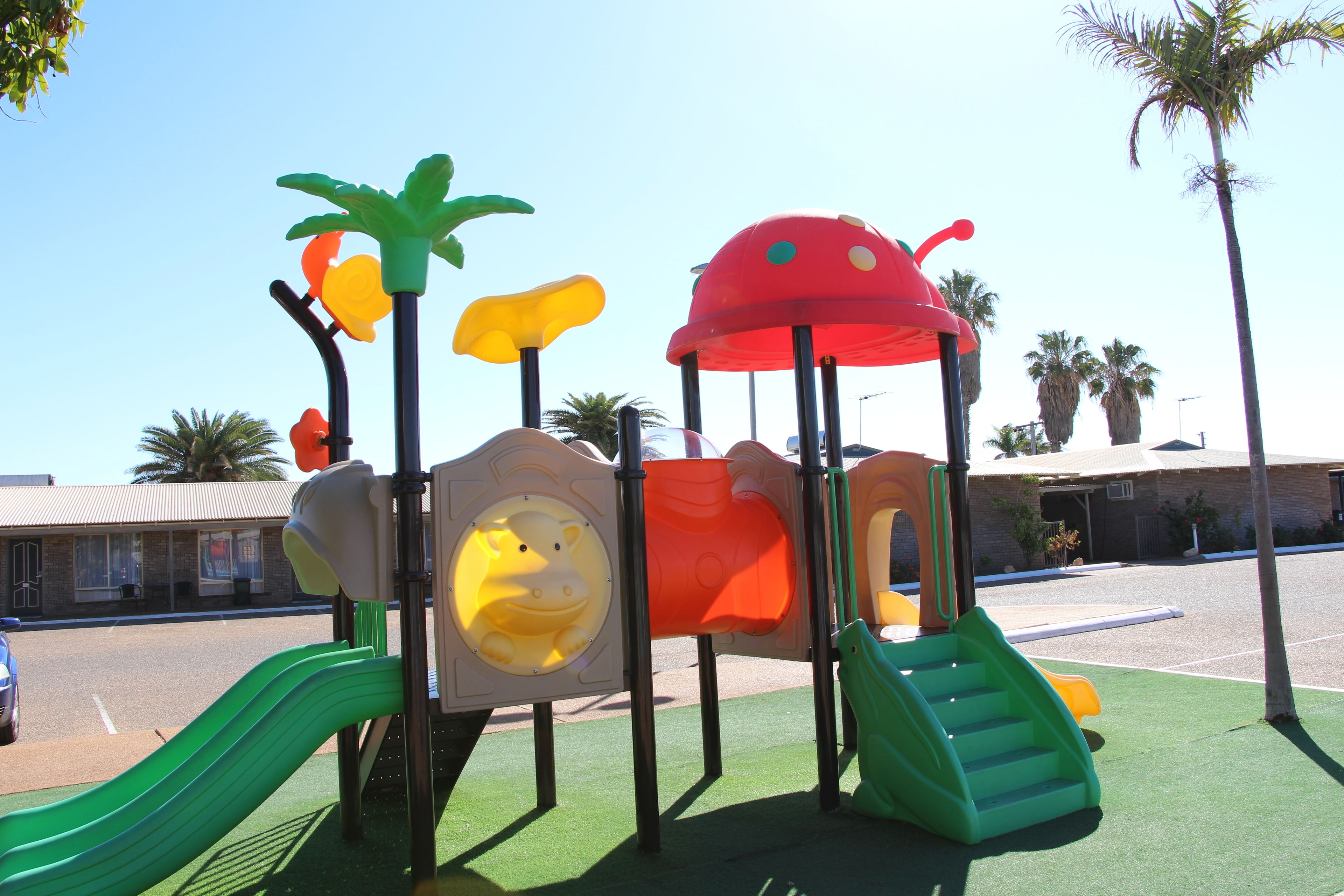 A playground with slides and climbing structures.