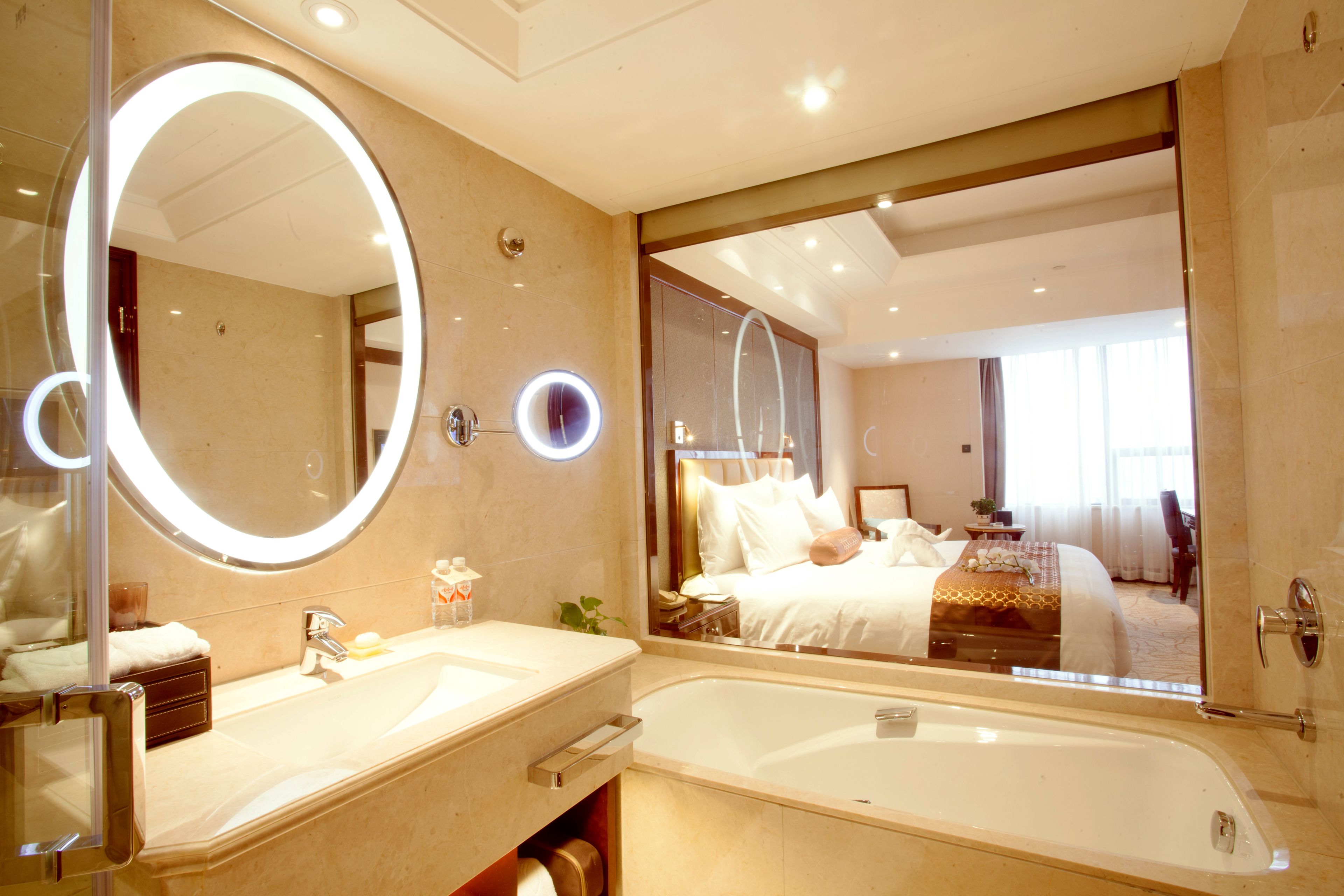 deluxe room | bathroom | separate bathtub and shower, rainfall showerhead, free toiletries