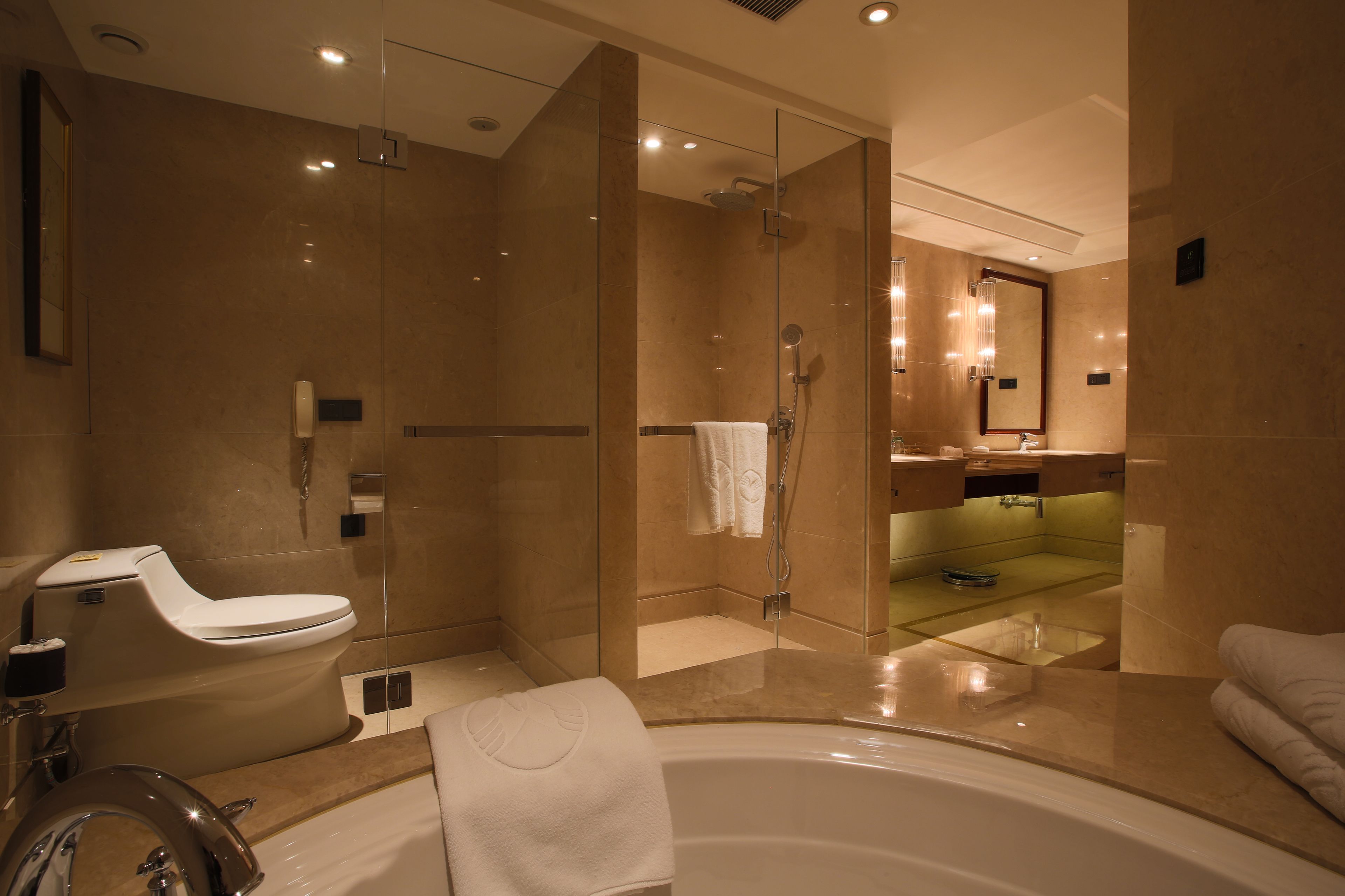 suite | bathroom | separate bathtub and shower, rainfall showerhead, free toiletries