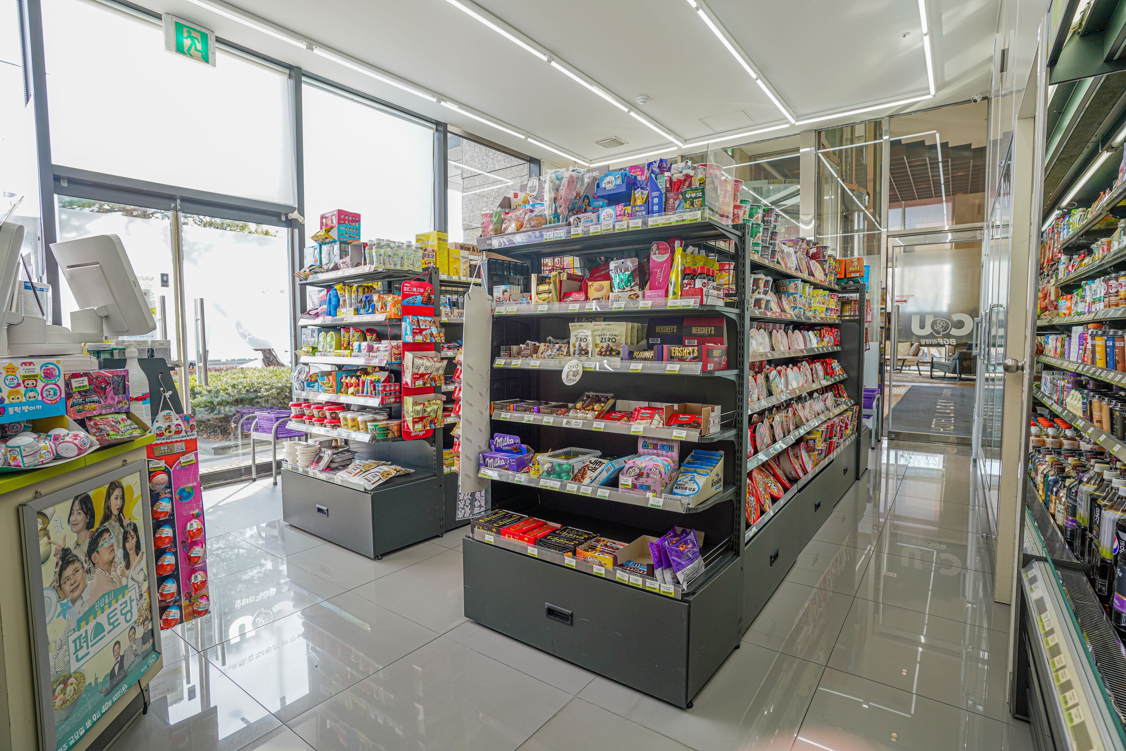A clean, well-lit store with shelves stocked with various products.