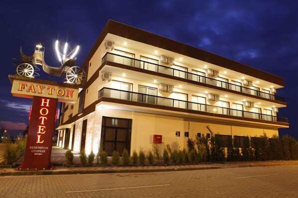 A multi-story hotel with a sign reading "Fayton Hotel" and a reception area. - Fayton Hotel (Akhisar)