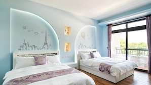 A hotel room with two beds, a cityscape mural on the walls, and a balcony with a view. - Fun Going B&B (Hualien City)