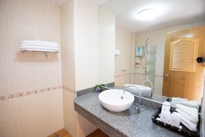 Junior Suite, 1 Queen Bed, Non Smoking, Garden View | Bathroom | Shower, free toiletries, hair dryer, slippers