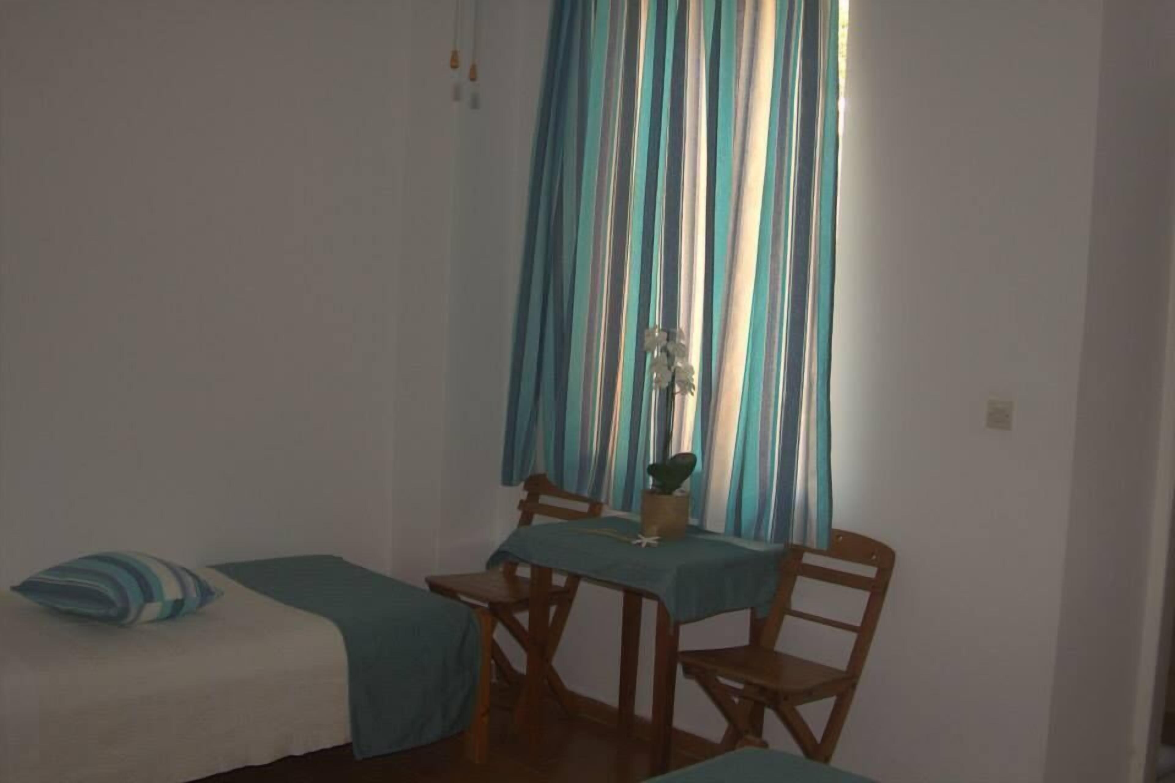 double or twin room, private bathroom | living area