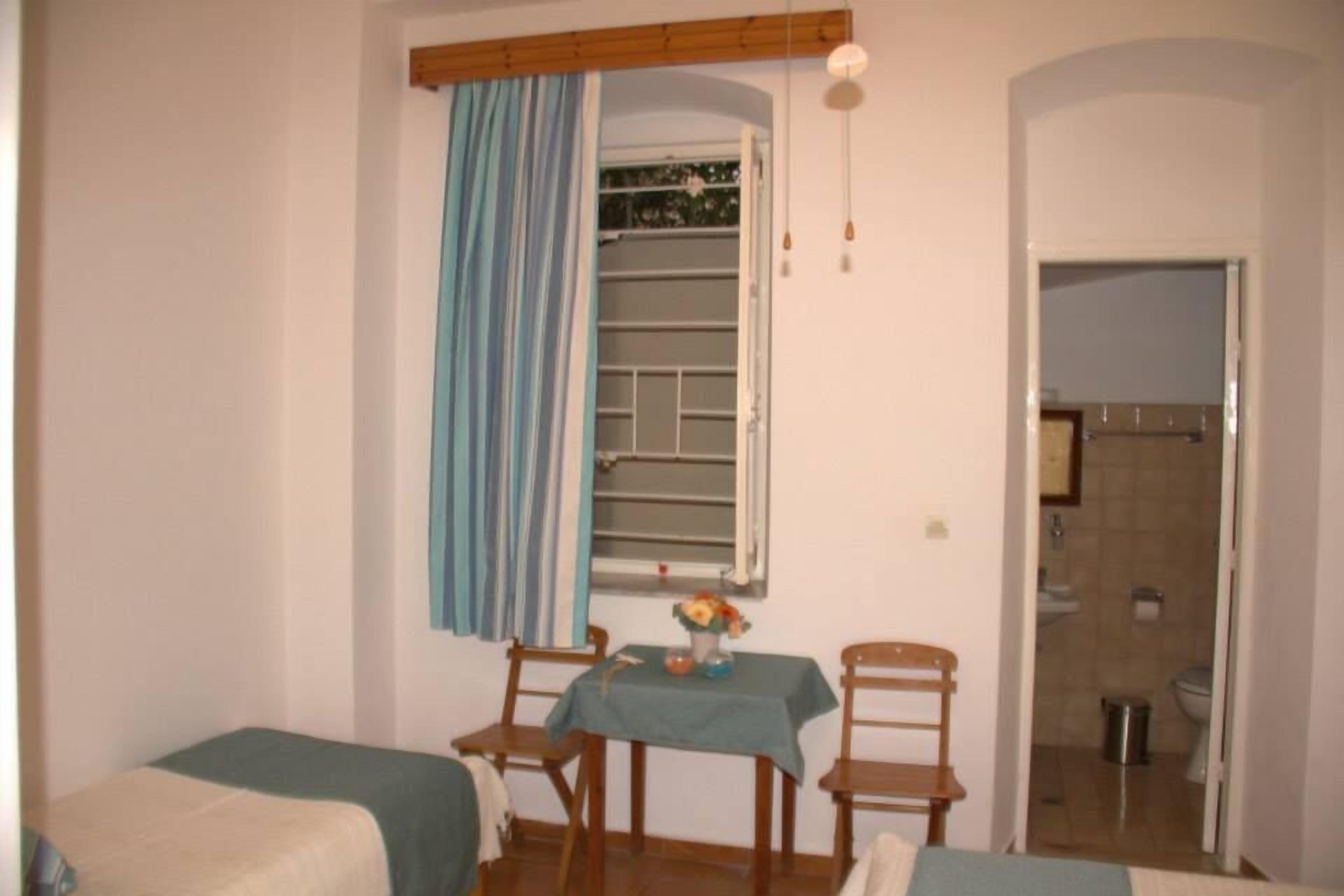 double or twin room, private bathroom | living area