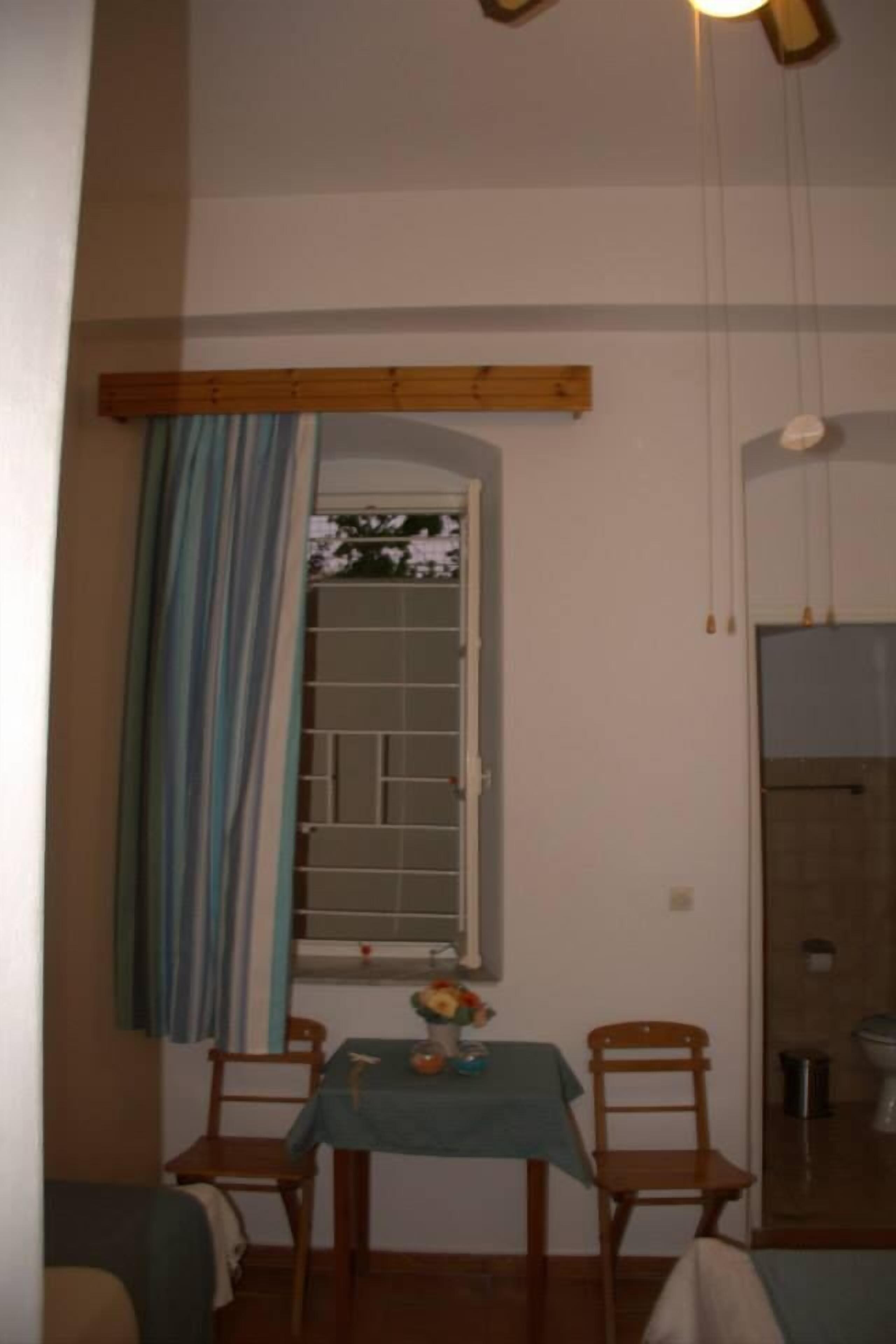 double or twin room, private bathroom | living area