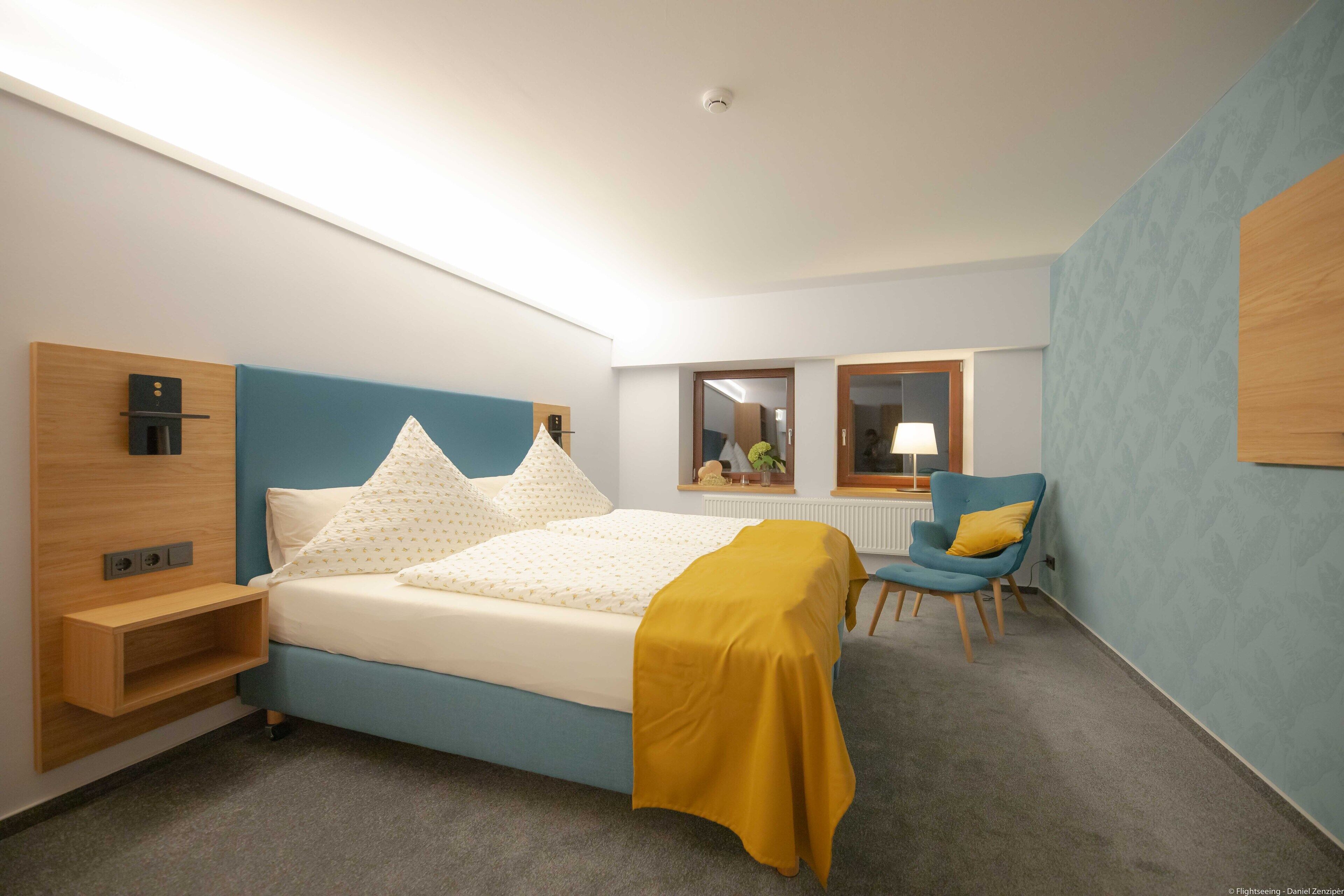 family room | 1 bedroom, premium bedding, minibar, laptop workspace