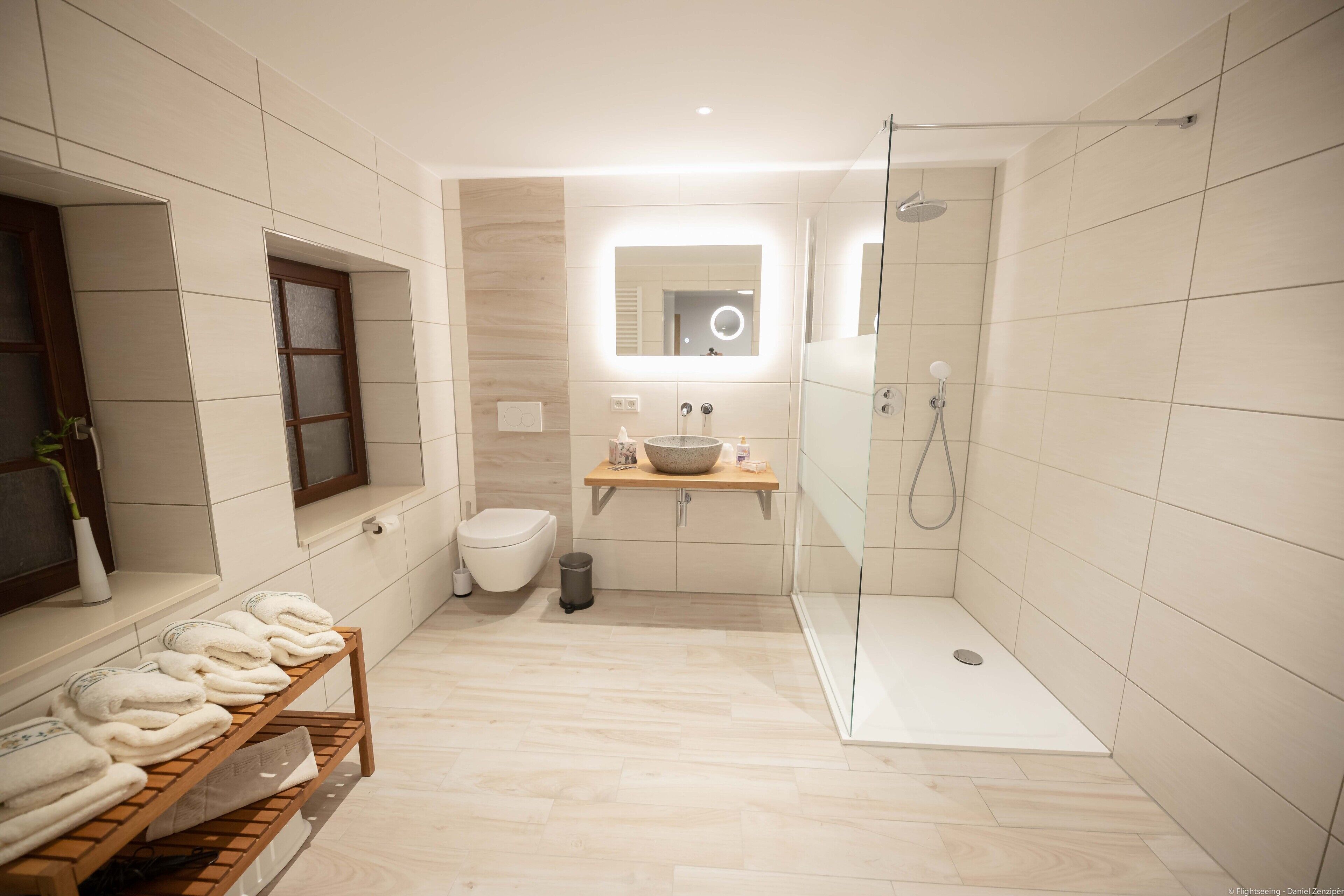 family room | bathroom | shower, hair dryer, towels