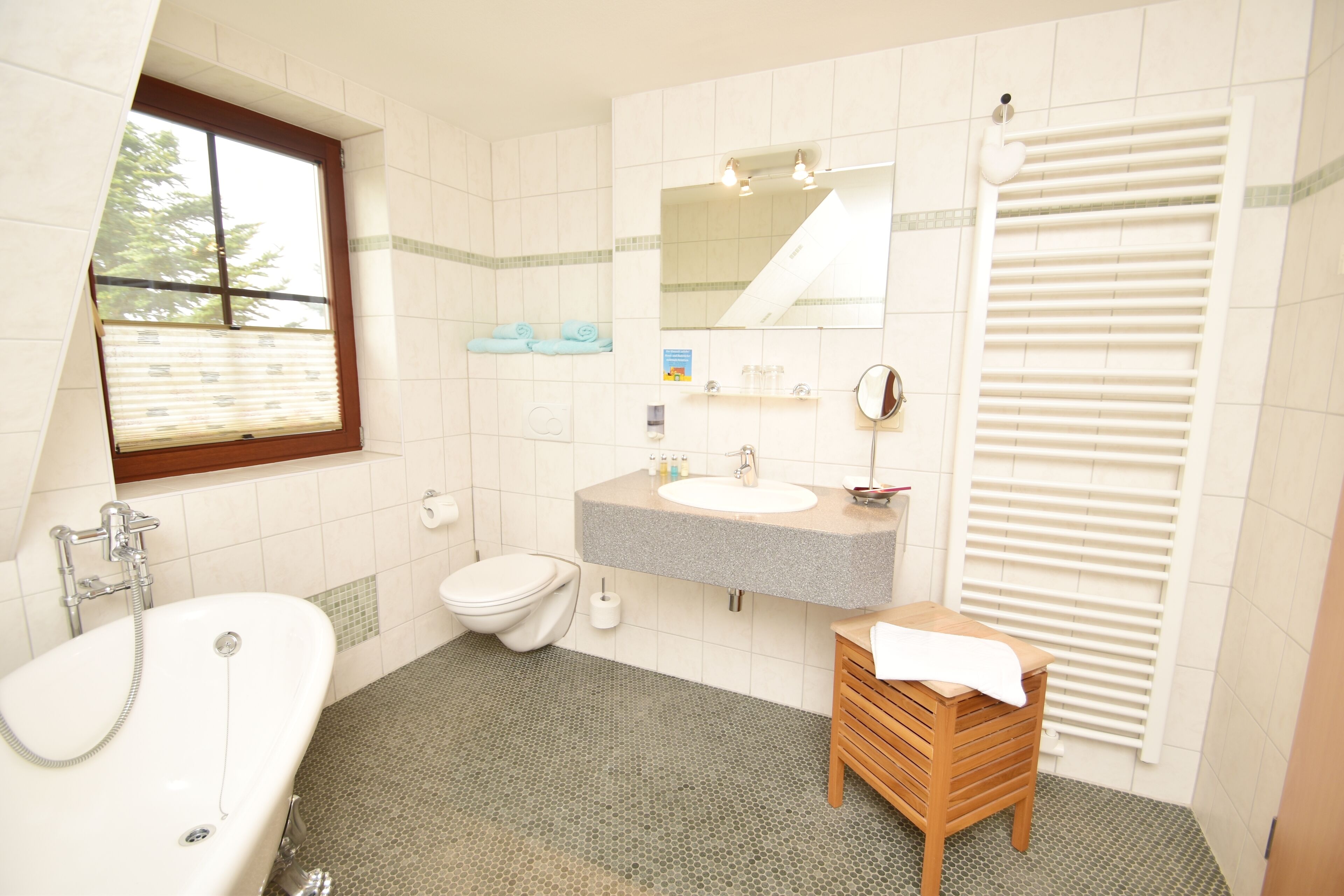 suite | bathroom amenities | shower, hair dryer, towels