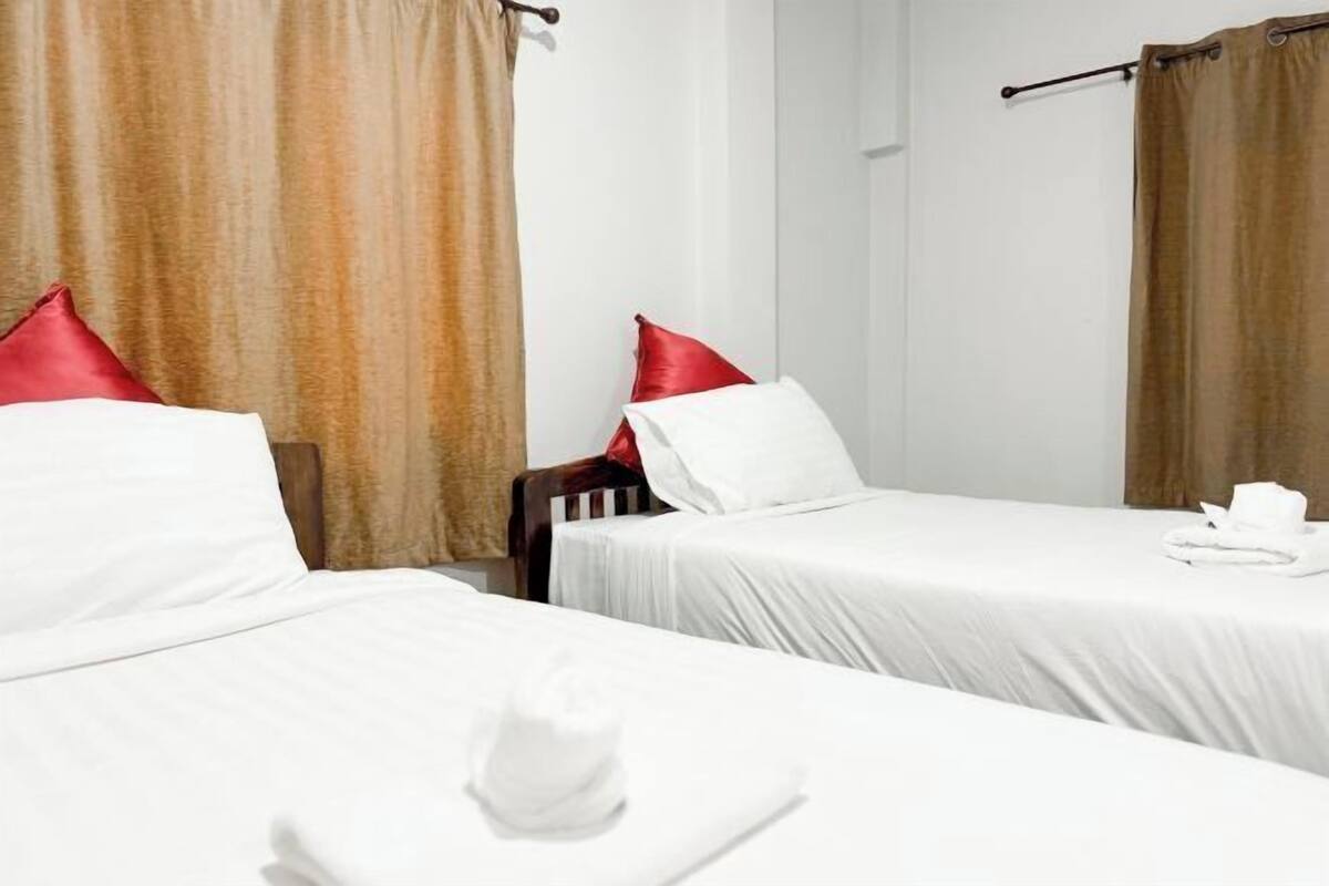Desk, blackout drapes, WiFi (free), bed sheets